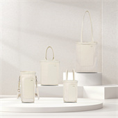 法國(guó)設(shè)計(jì)師再生帆布桶包超纖拼接pu皮束口高級(jí)感通勤手拎包定做